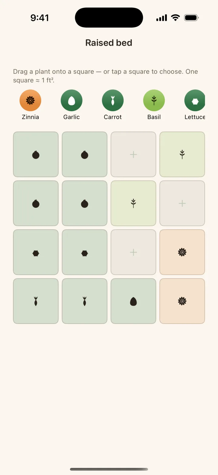 A square-foot garden bed in the Dibble app: a four by four grid filled with tomatoes, basil, lettuce, carrots, garlic, and zinnias.